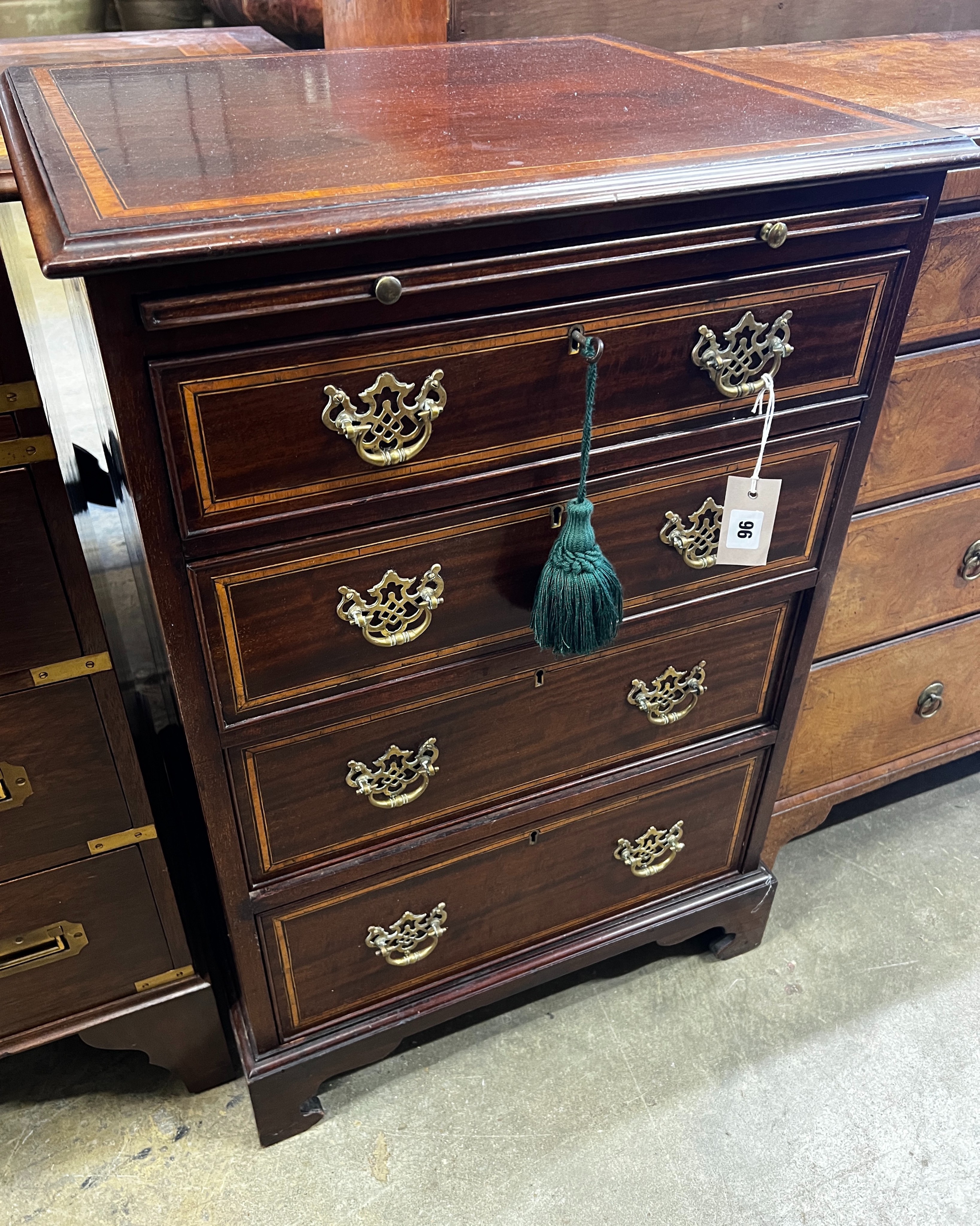 A small George III style satinwood banded mahogany four drawer chest fitted slide, width 56cm, depth 48cm, height 82cm